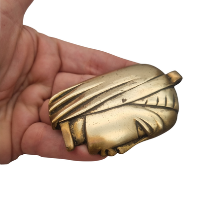 Large bronze sculptural pendant with a stylized female head, circa 1980-1990
