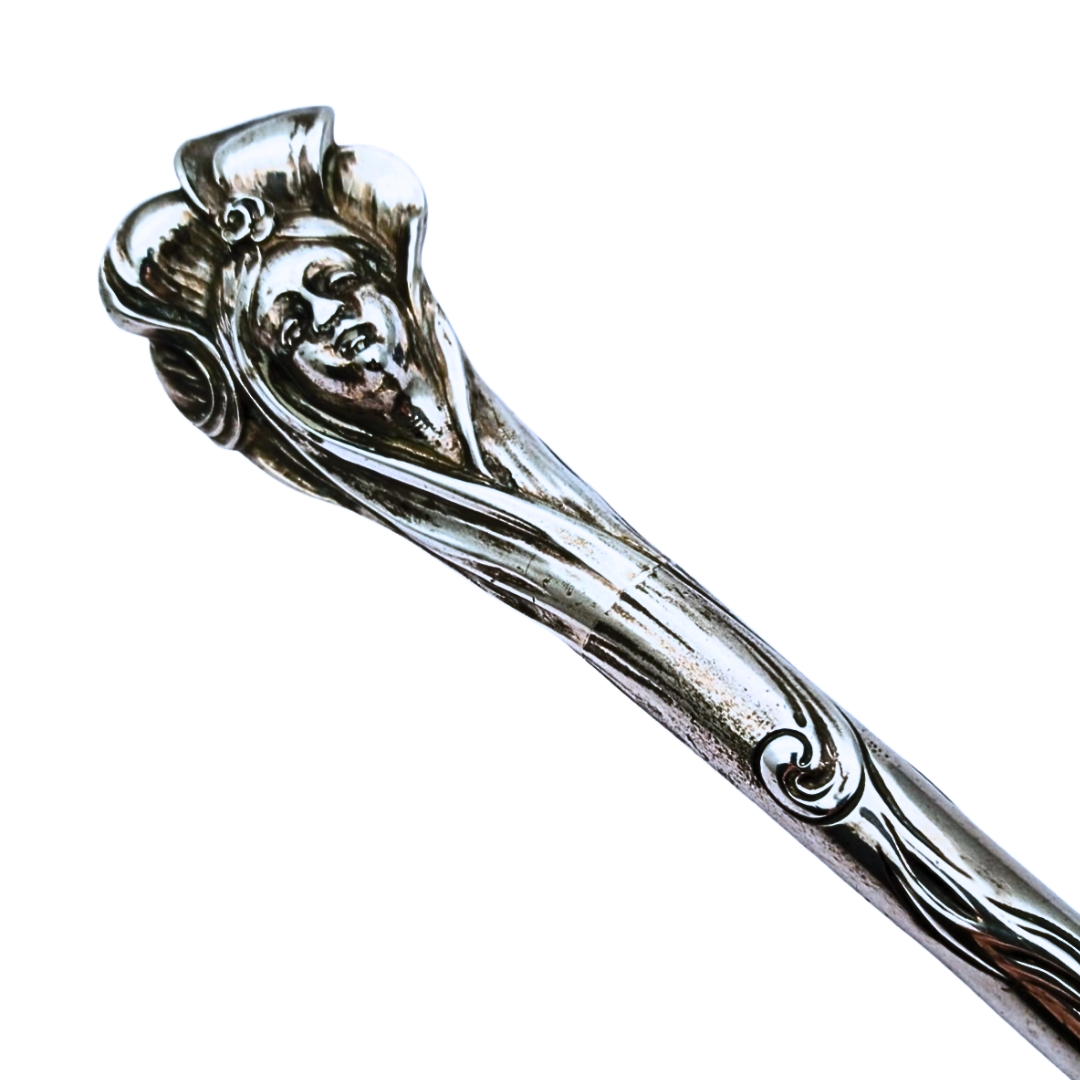 Jugendstil silver umbrella handle with female face circa 1900