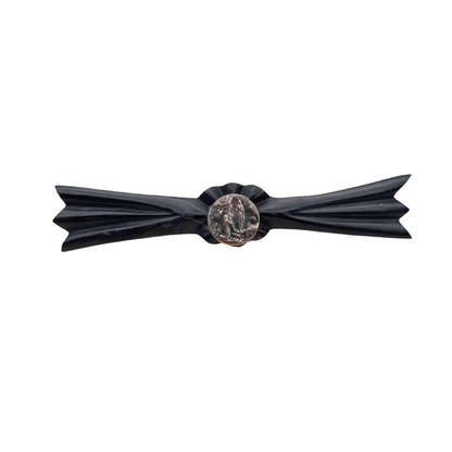 Art Deco vulcanite brooch, religious mourning jewelry, Virgin of Lourdes, circa 1930-1940.