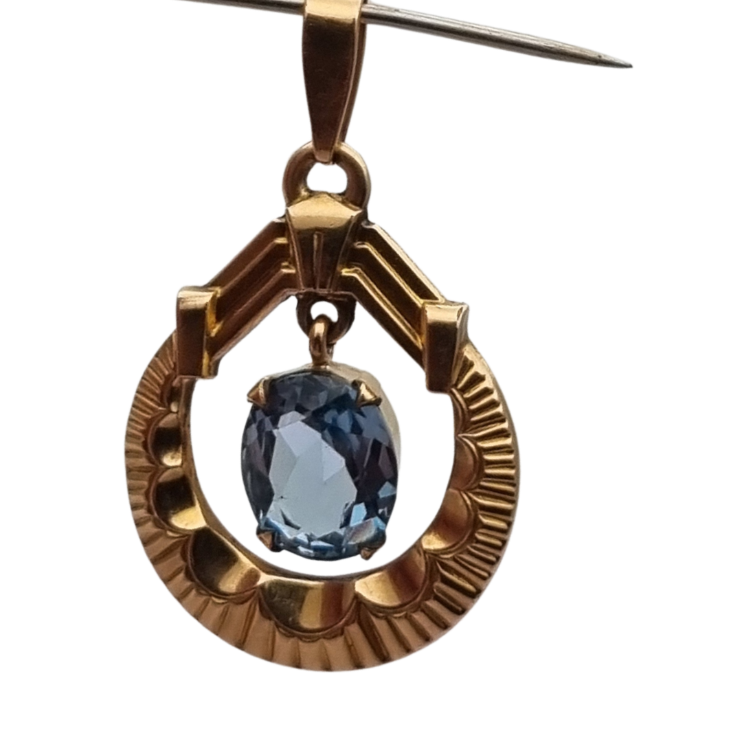 Colgante francés FIX Art Déco en oro laminado con piedra azul facetada, circa 1930–1940