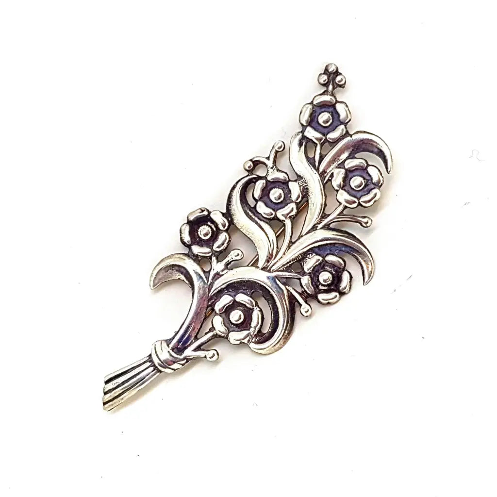 Broche flor en plata de primera ley. Circa 1940. Joyería antigua y vintage.
