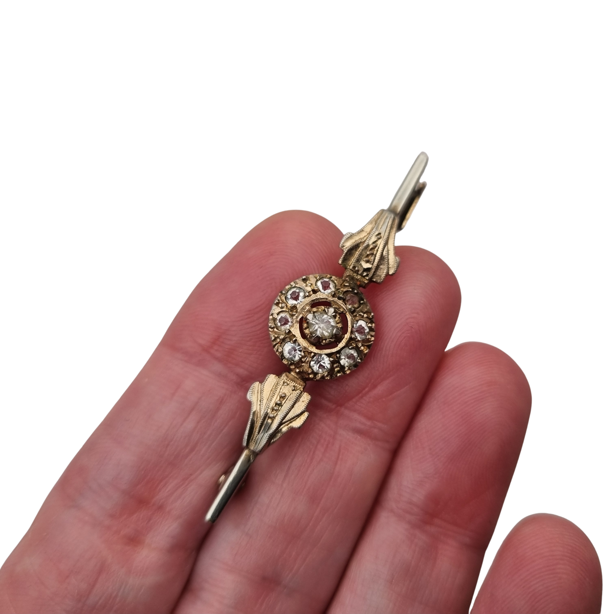 Antique Belle Époque brooch in gilded metal with clear stones, Europe, ca. 1890–1920