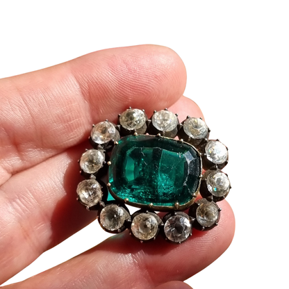 Antique Victorian silver, gold, and green and white paste brooch, inspired by the aesthetics of Queen Victoria's jewelry. Europe, circa 1890