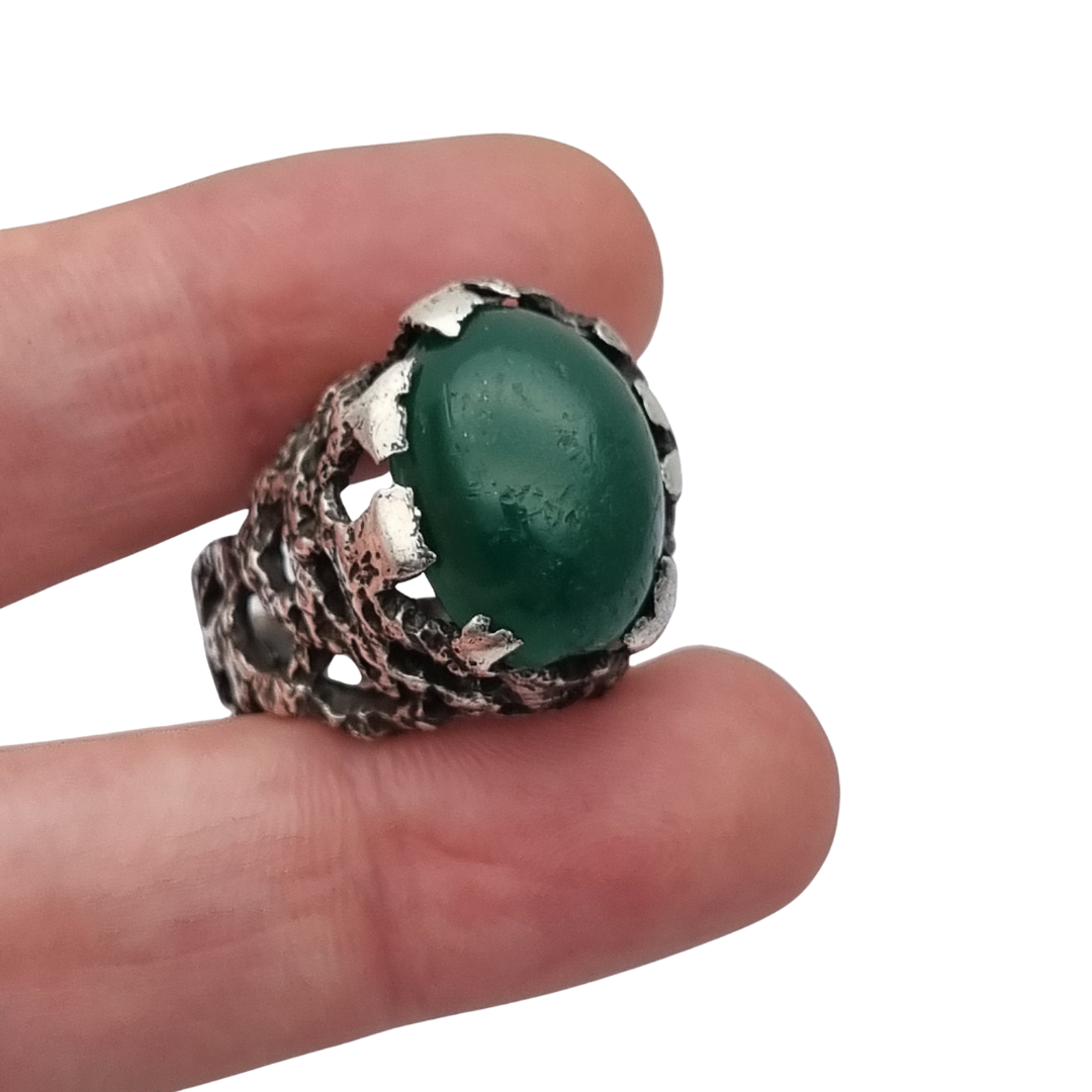 Brutalist textured silver ring with green cabochon organic design circa 1970