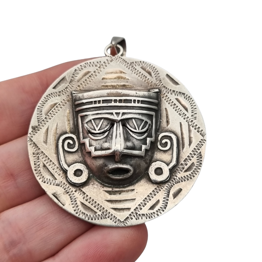 Colgante reversible de plata 925 con calendario azteca y máscara, México, años 60-70