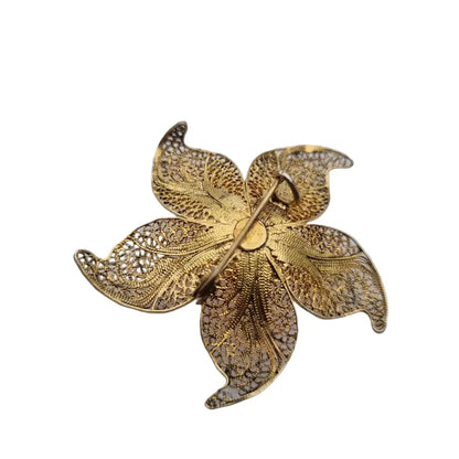 Broche flor de filigrana en plata dorada regala joyas antiguas y vintage