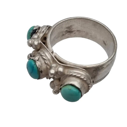 Anillo de plata y turquesas joyería tribal hecha a mano con encanto rústico.