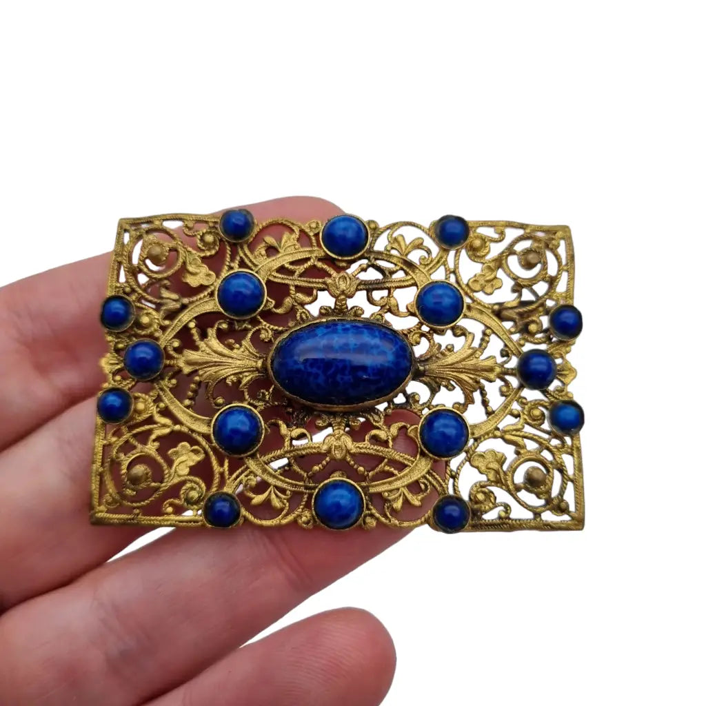 Broche modernista rectangular dorado y azul de los años 40 para mujer.