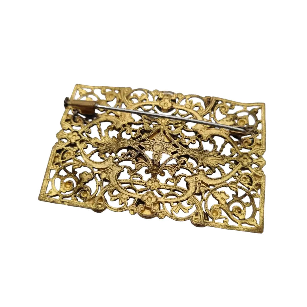 Broche modernista rectangular dorado y azul de los años 40 para mujer.