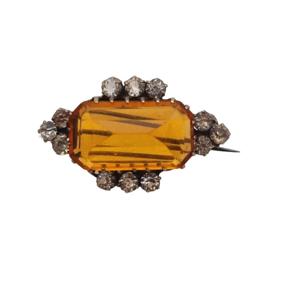 Broche vintage art deco de plata con pedrería naranja y blanca regalo ideal.