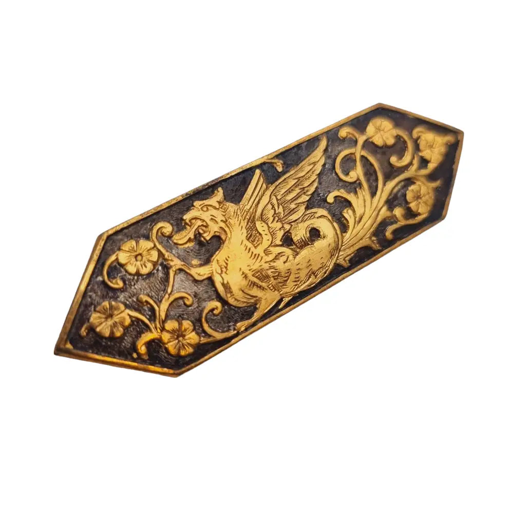 Broche dorado de dragon antiguo pin floral alargado para coleccionistas.