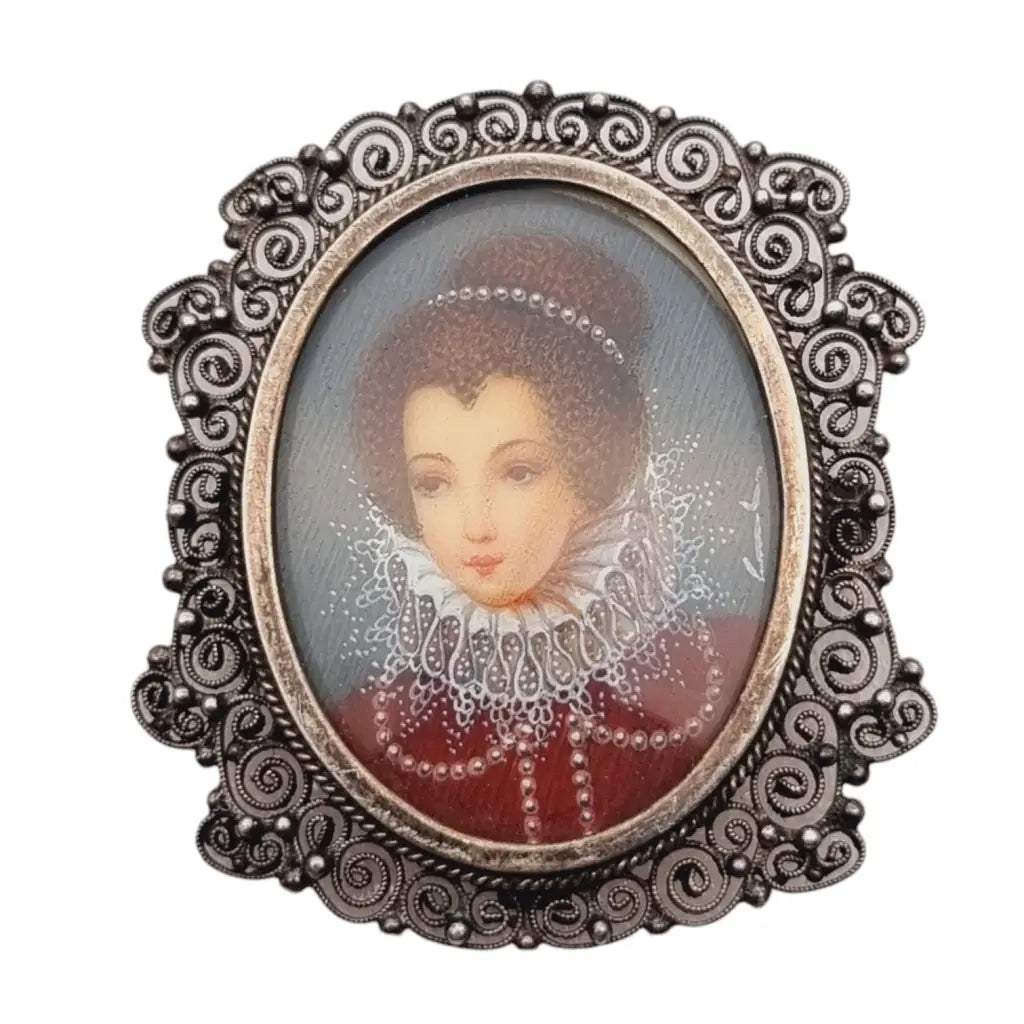 Broche victoriano con miniatura pintada a mano y filigrana de plata esterlina.