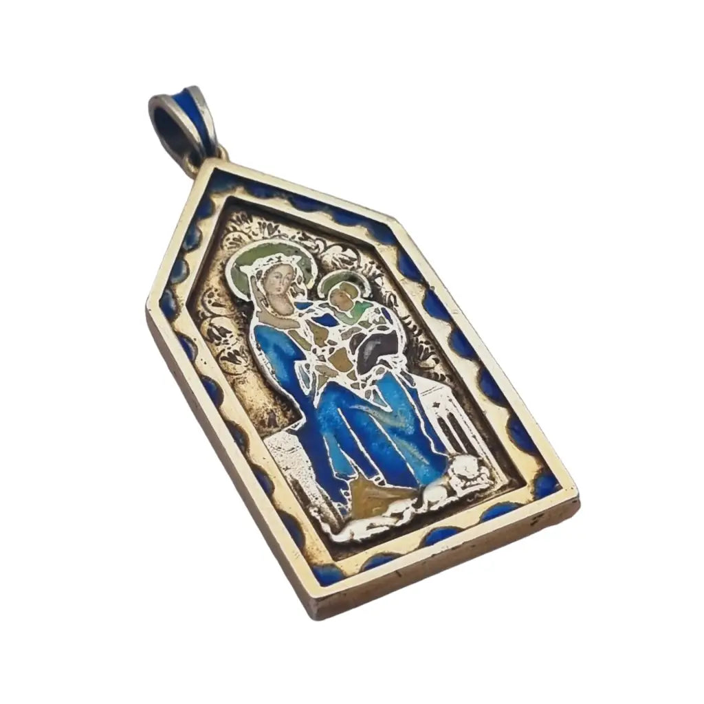 Medalla virgen art nouveau en plata dorada y esmalte azul modernismo religioso.