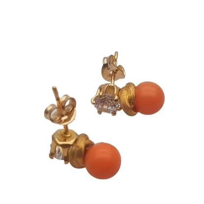 Pendientes vintage ’tu y yo’ en tono dorado perla coral con circonitas