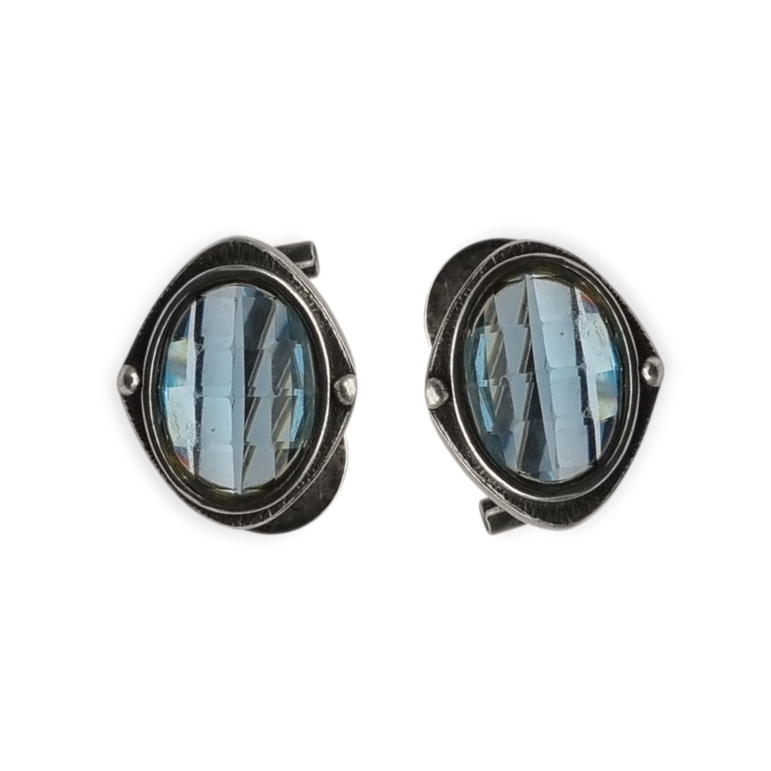 Oval silver earrings with faceted blue stone, circa 1980-90
