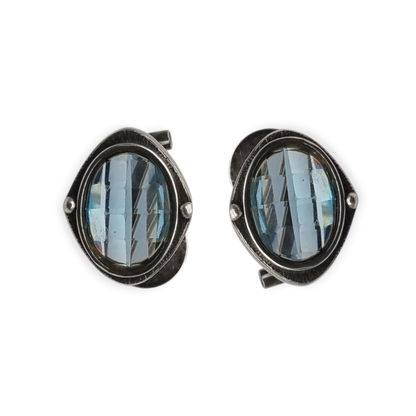 Oval silver earrings with faceted blue stone, circa 1980-90