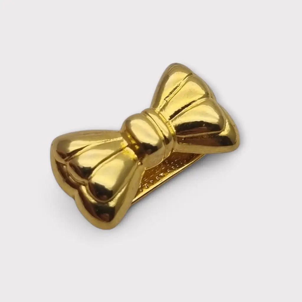 Acortador de collar con lazo dorado elegante y funcional años 80. Gargantilla