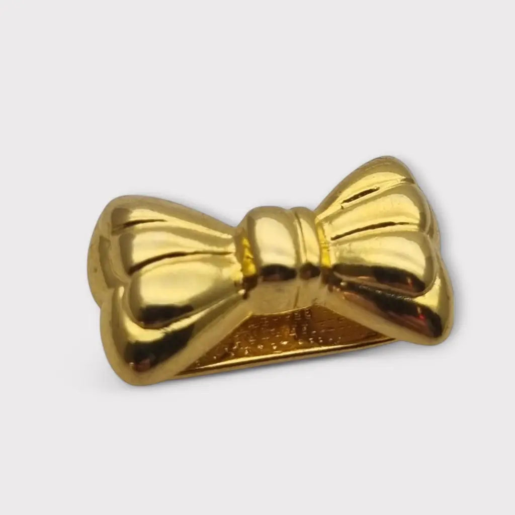 Acortador de collar con lazo dorado elegante y funcional años 80. Gargantilla