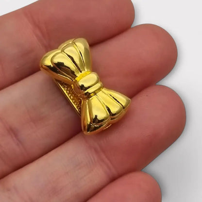 Acortador de collar con lazo dorado elegante y funcional años 80. Gargantilla