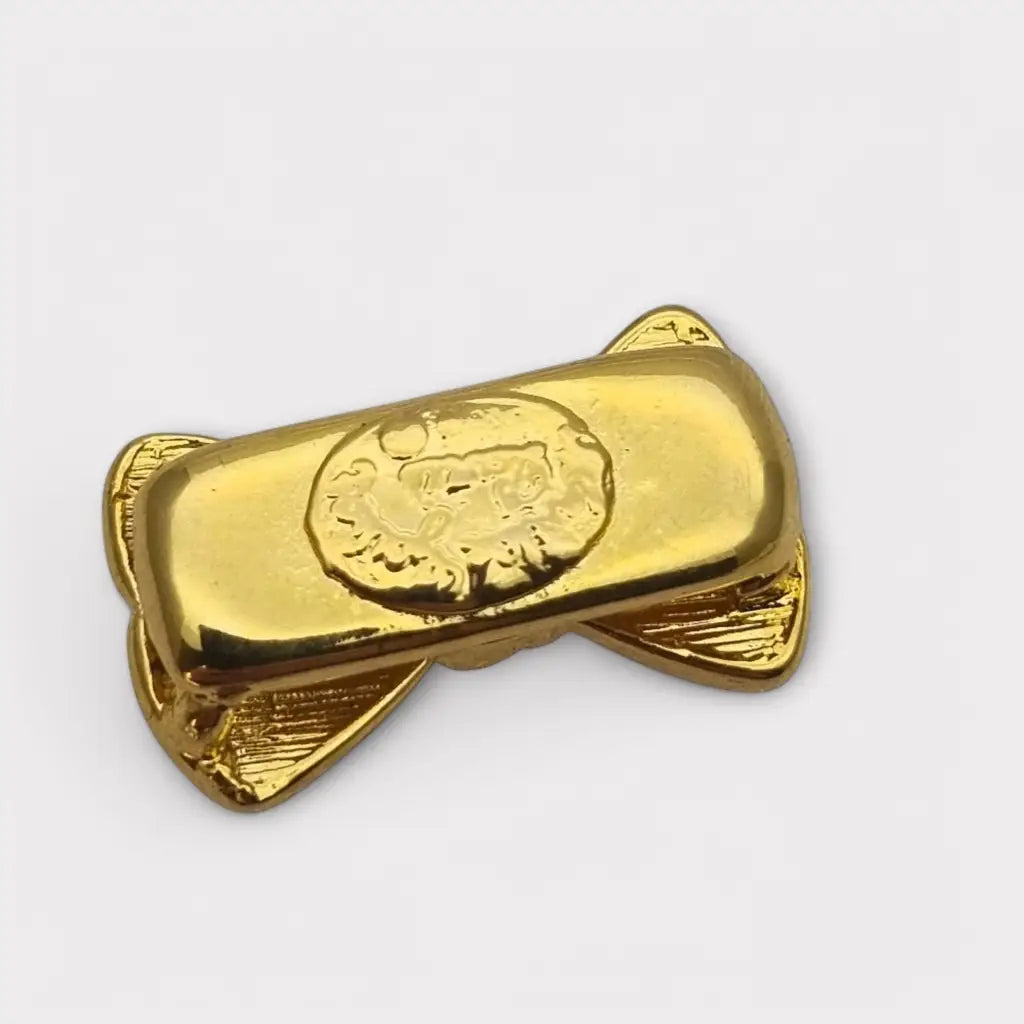 Acortador de collar con lazo dorado elegante y funcional años 80. Gargantilla