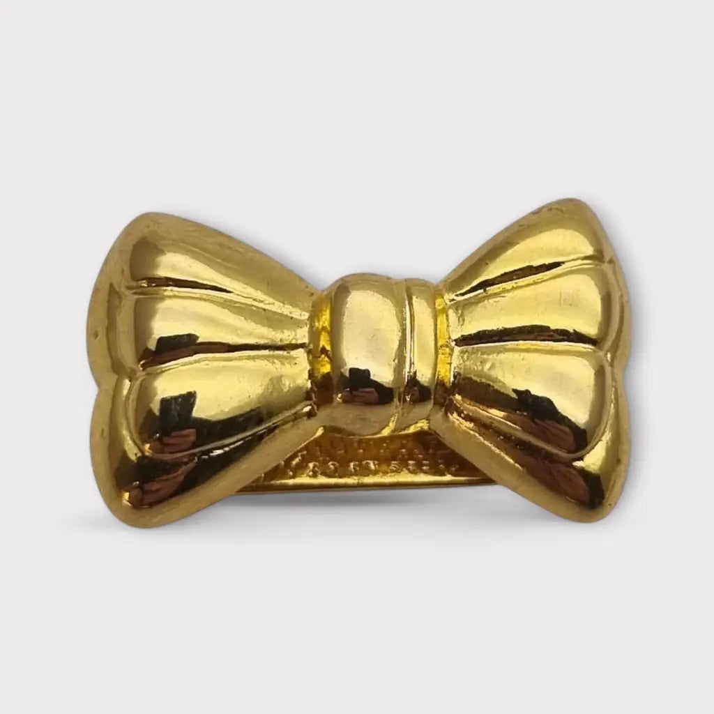 Acortador de collar con lazo dorado elegante y funcional años 80. Gargantilla