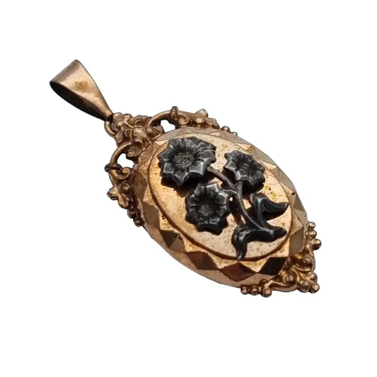 Colgante medallón victoriano colgante antiguo dorado con flores plateadas