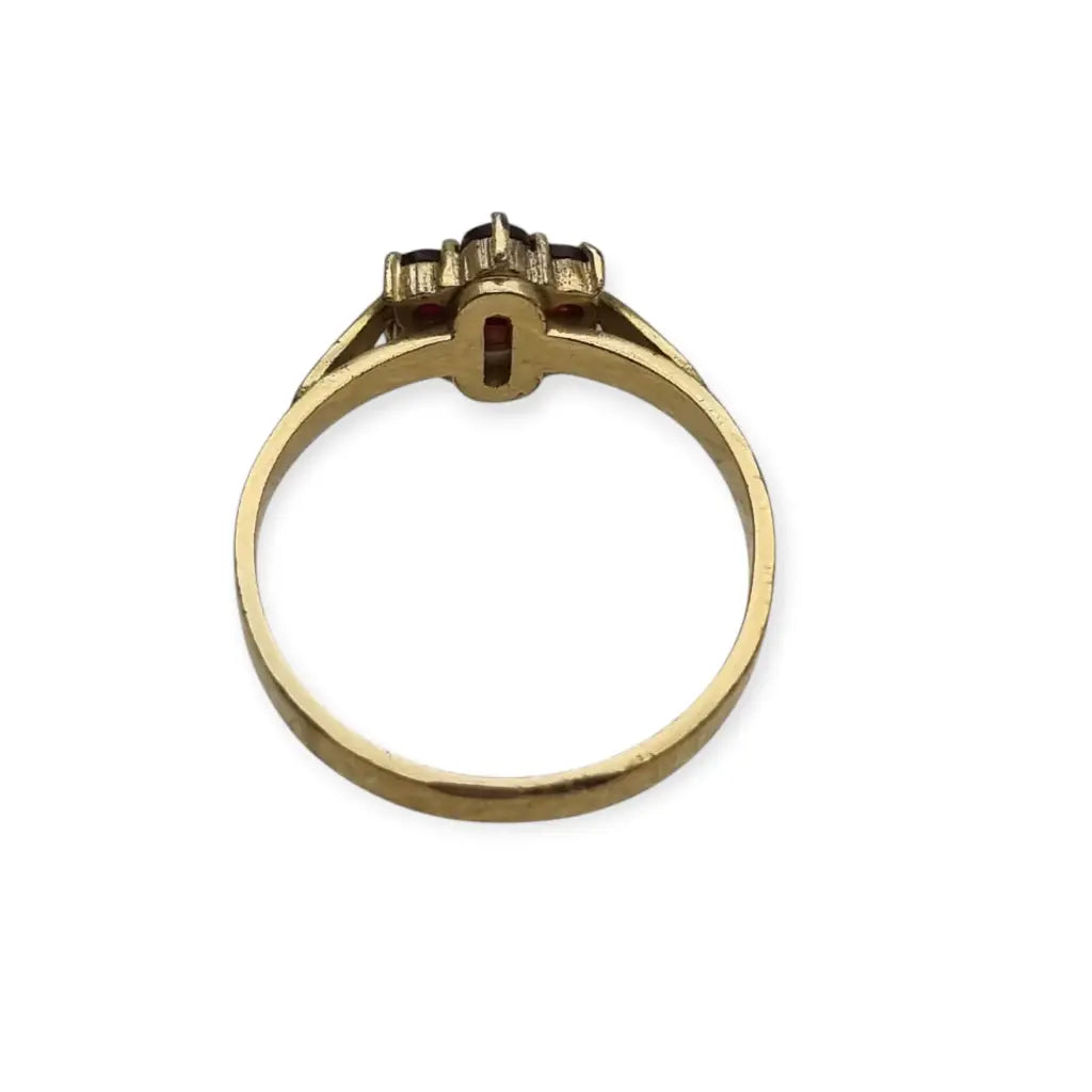 Anillo vintage en plata bañada oro con granates diseño rosetón años 60.