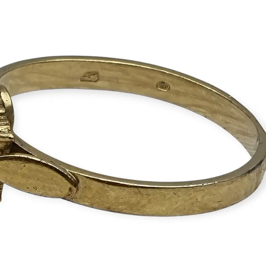 Anillo vintage en plata bañada oro con granates diseño rosetón años 60.