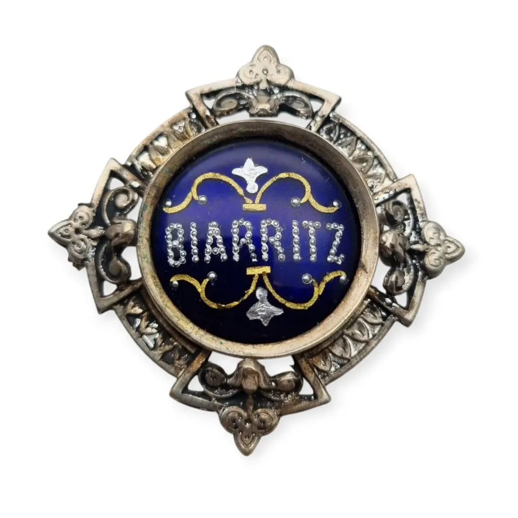 Antiguo broche Belle Époque de souvenir Biarritz esmalte azul circa 1900.