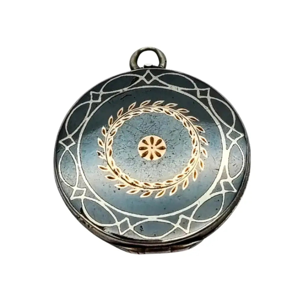 Antiguo Guardapelo redondo nielado en plata con grabado geométrico 1910–1920