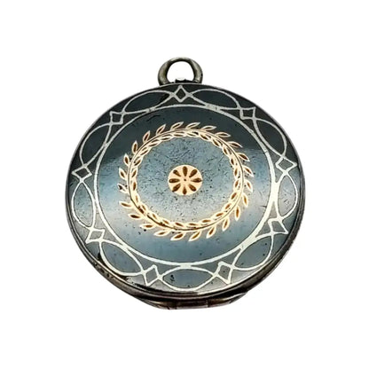 Antiguo Guardapelo redondo nielado en plata con grabado geométrico 1910–1920