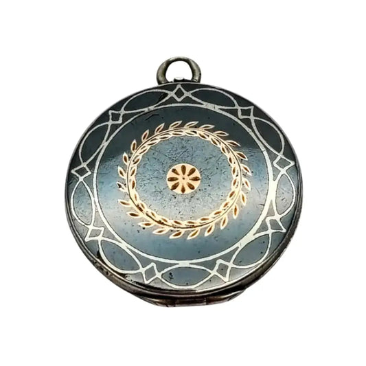 Antiguo Guardapelo redondo nielado en plata con grabado geométrico 1910–1920