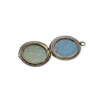 Antiguo Guardapelo redondo nielado en plata con grabado geométrico 1910–1920