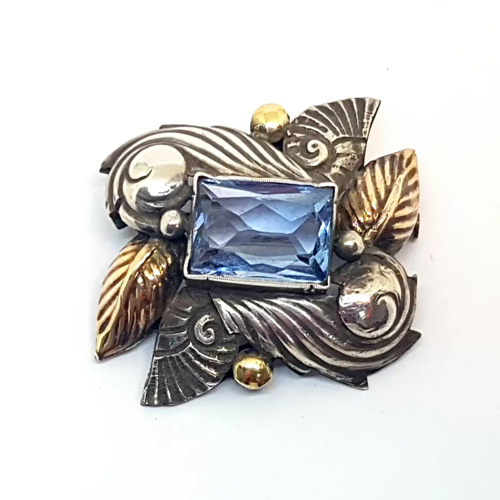 Broche alfiler Art Deco de plata antigua con oro laminado imitación aguamarina