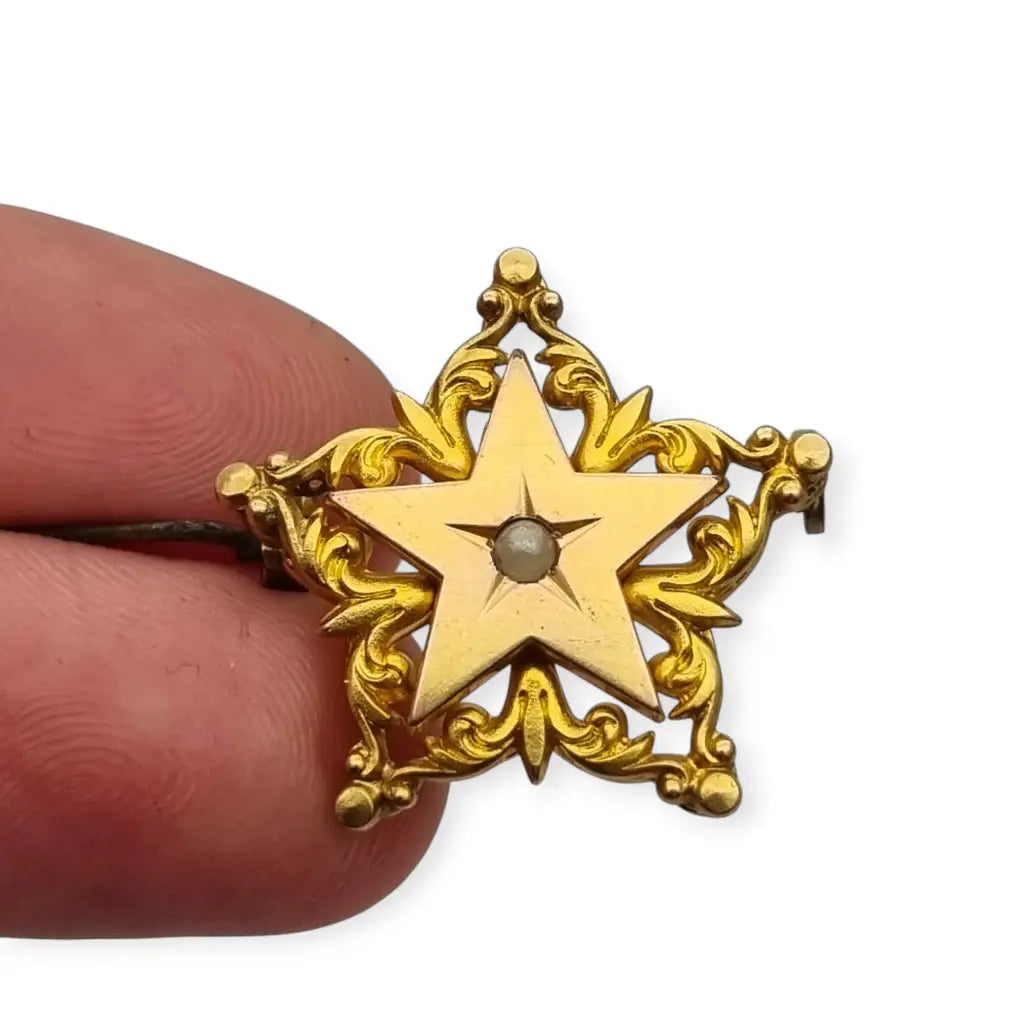 Broche antiguo de estrella victoriano oro FIX con perla coleccionable 1900.