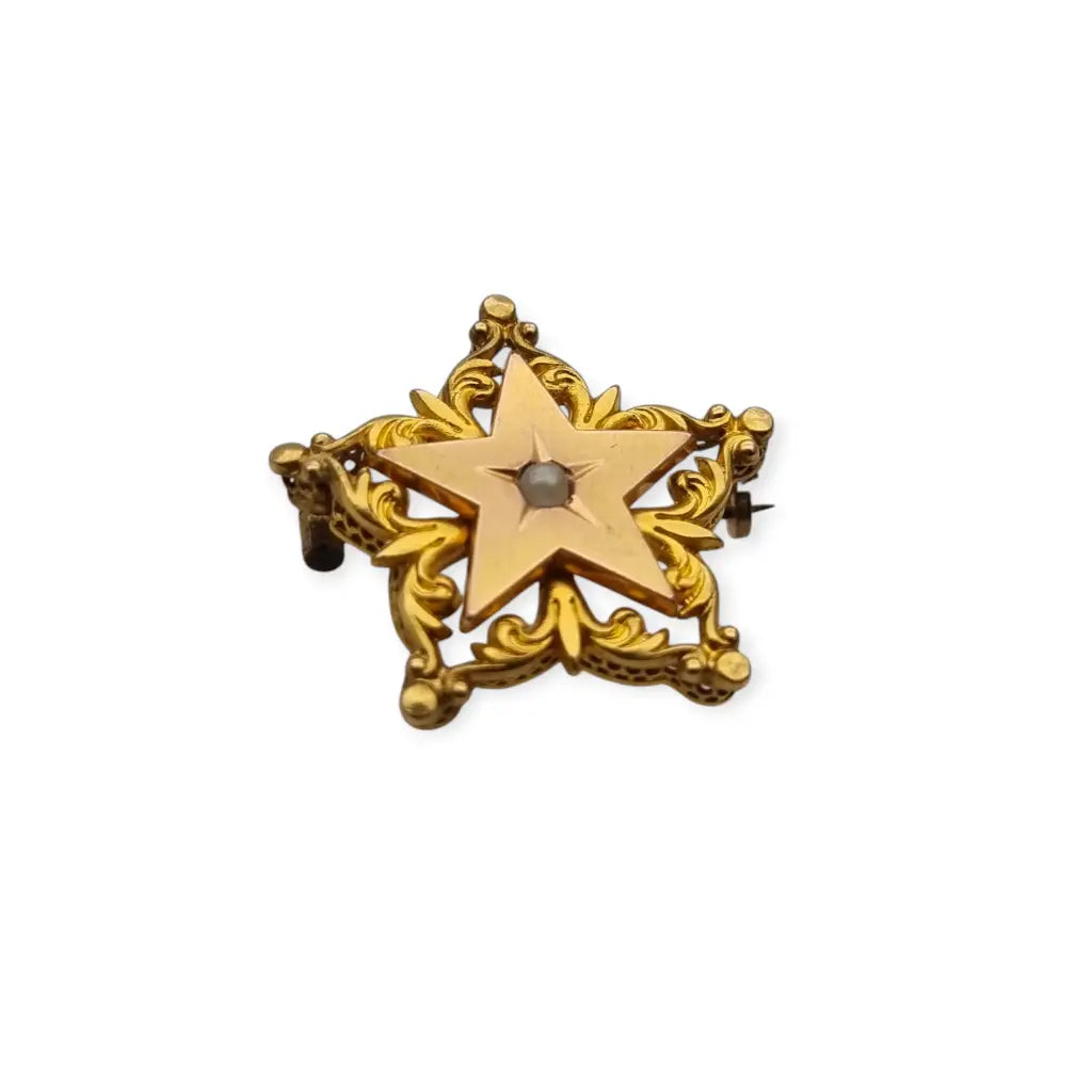 Broche antiguo de estrella victoriano oro FIX con perla coleccionable 1900.