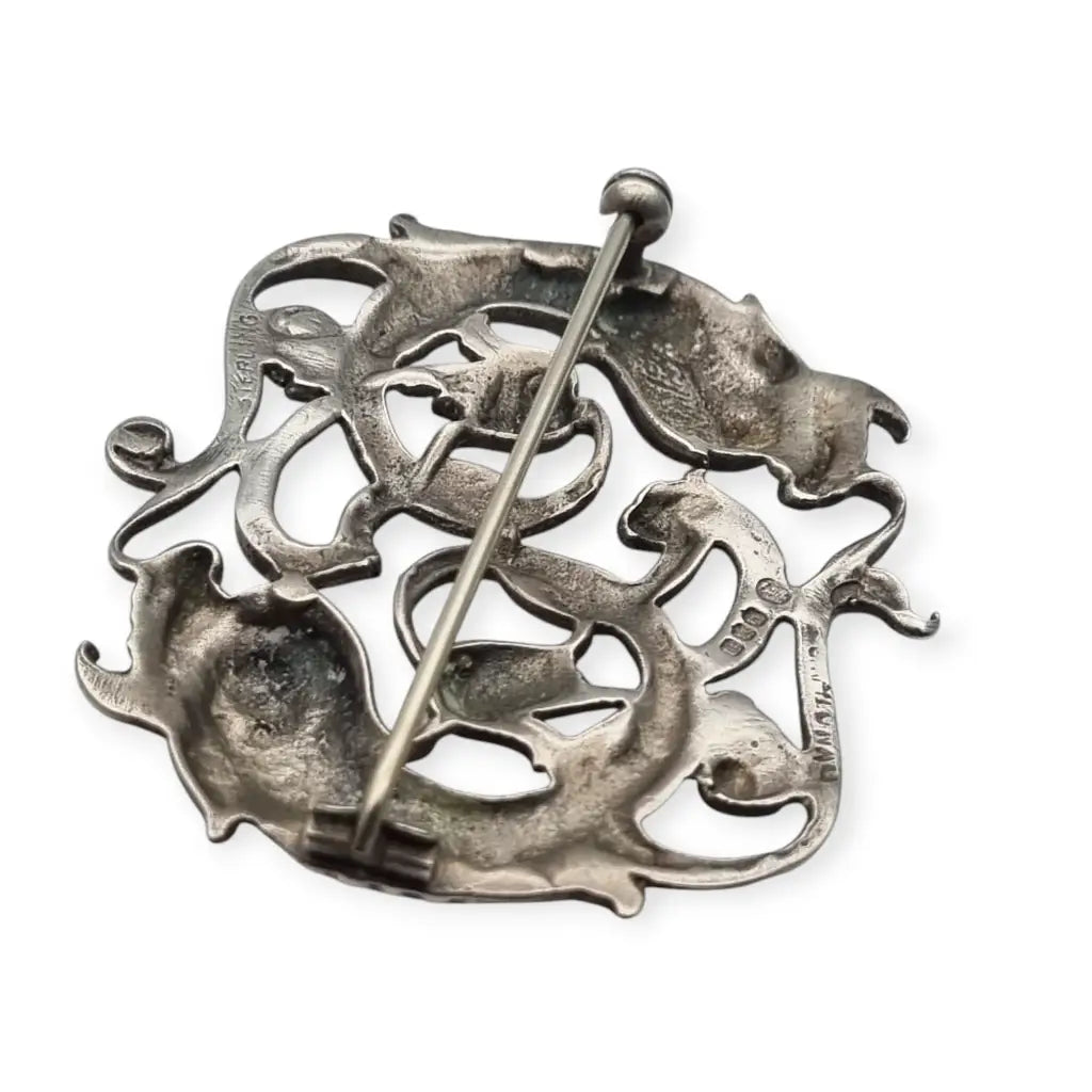 Broche antiguo del signo Piscis en plata de ley circa 1950. Joya simbólica