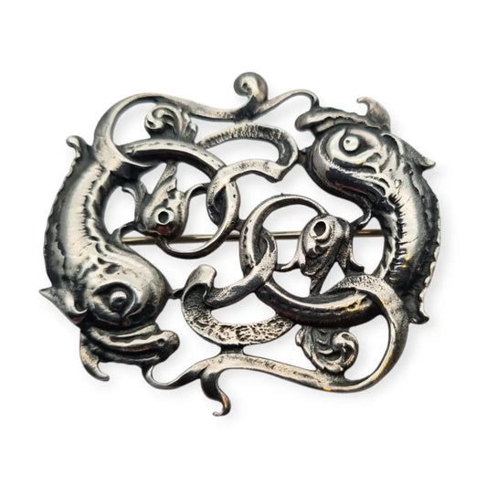 Broche antiguo del signo Piscis en plata de ley circa 1950. Joya simbólica