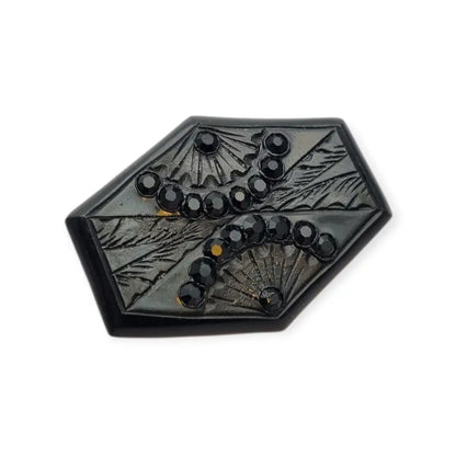 Broche art déco en baquelita negra tallada con strass forma hexagonal circa