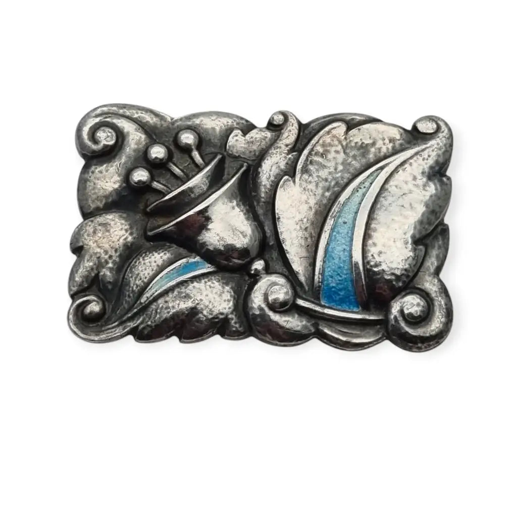 Broche Art Deco en plata con esmalte azul estilo floral Nouveau circa 1920.