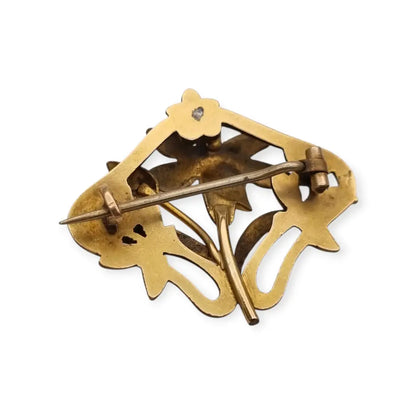 Broche Art Nouveau años 1910‑20 en metal dorado motivo floral. LaBizarreSusu
