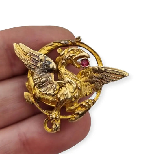 Broche Art Nouveau de grifo mitológico o dragón ORIA Oro relleno y rubí