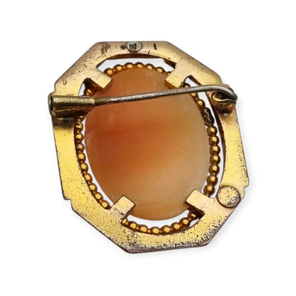 Broche camafeo vintage con perfil femenino en relieve marco geométrico Art Déco