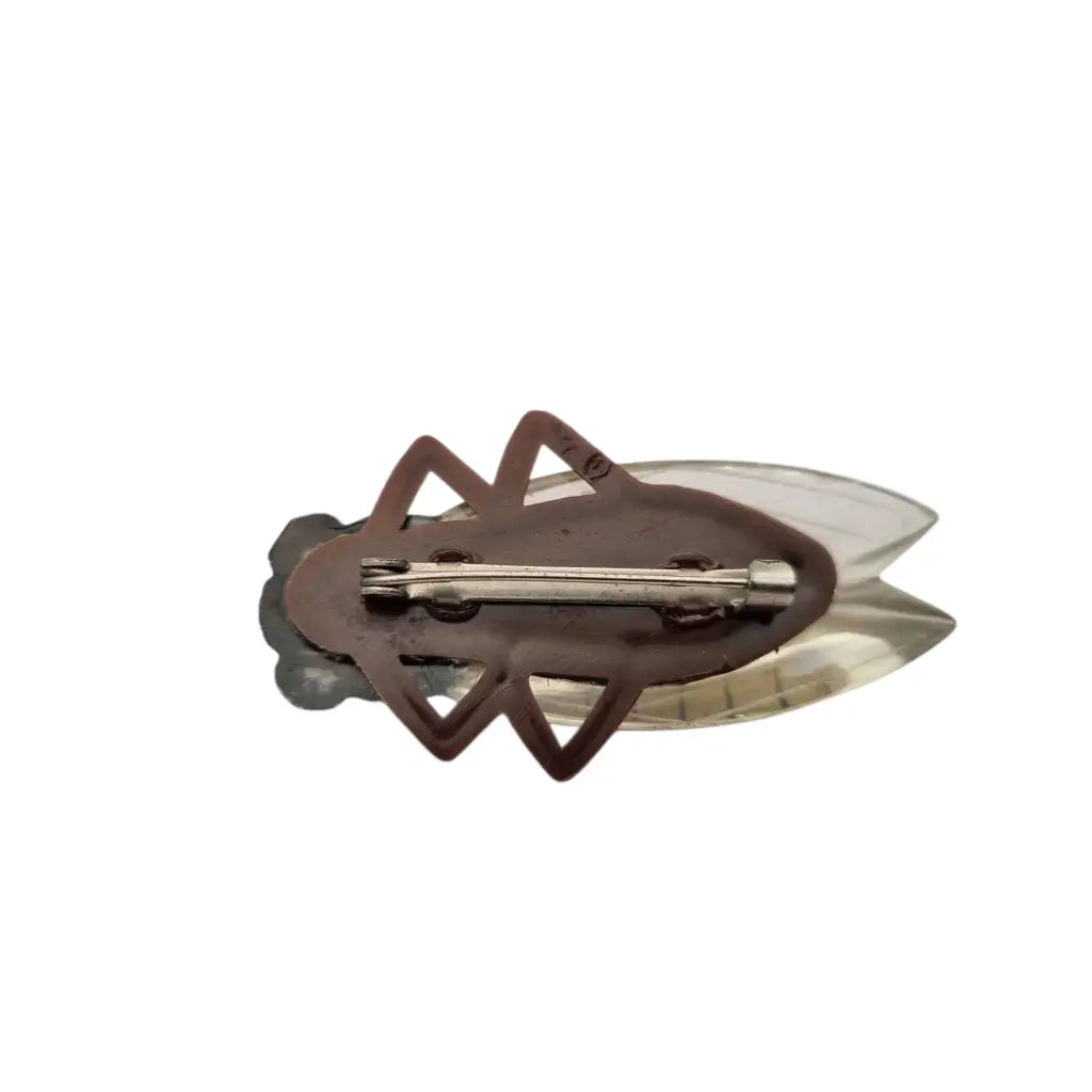 Broche cigarra vintage francesa años 40-50 de lucite en tonos marrones.