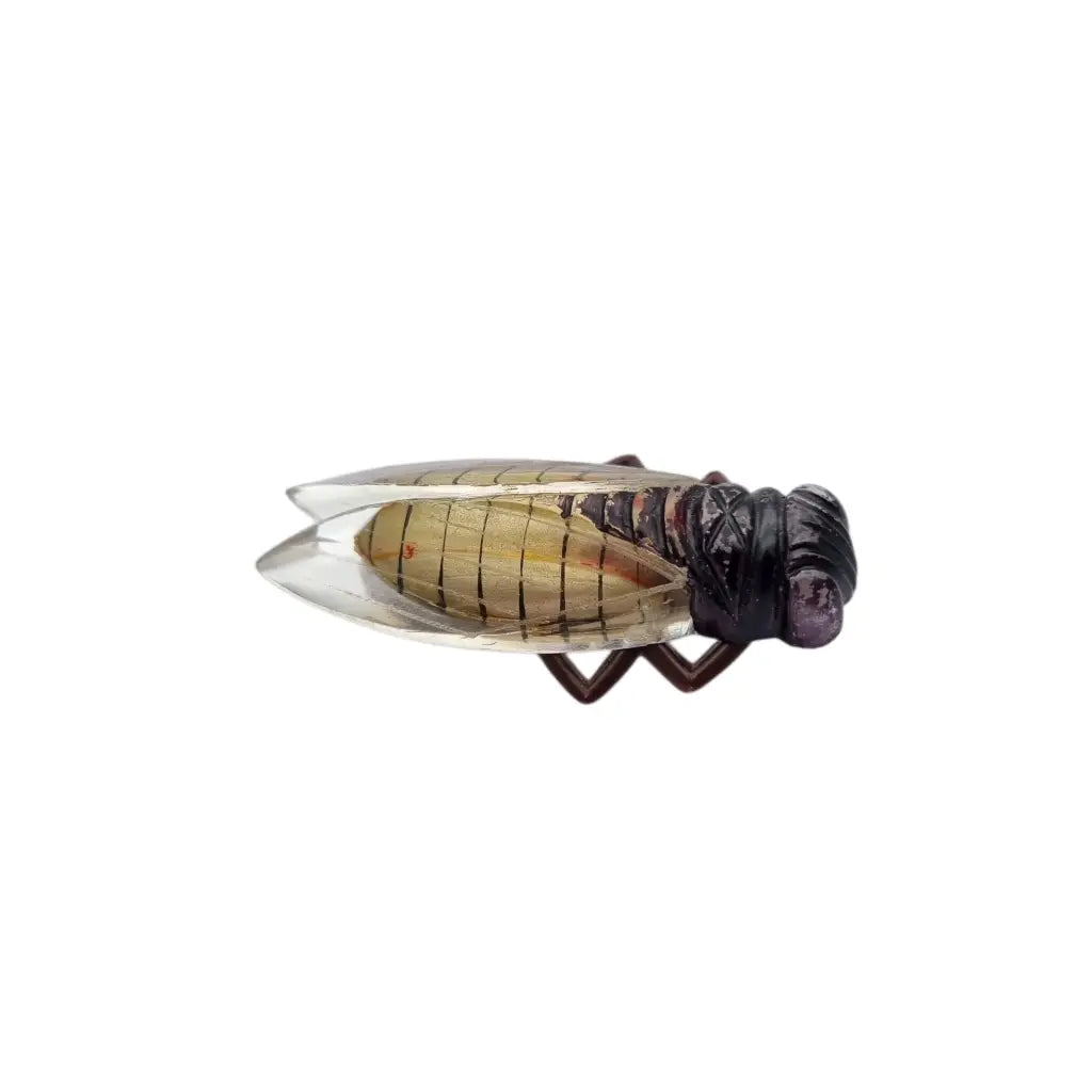 Broche cigarra vintage francesa años 40-50 de lucite en tonos marrones.