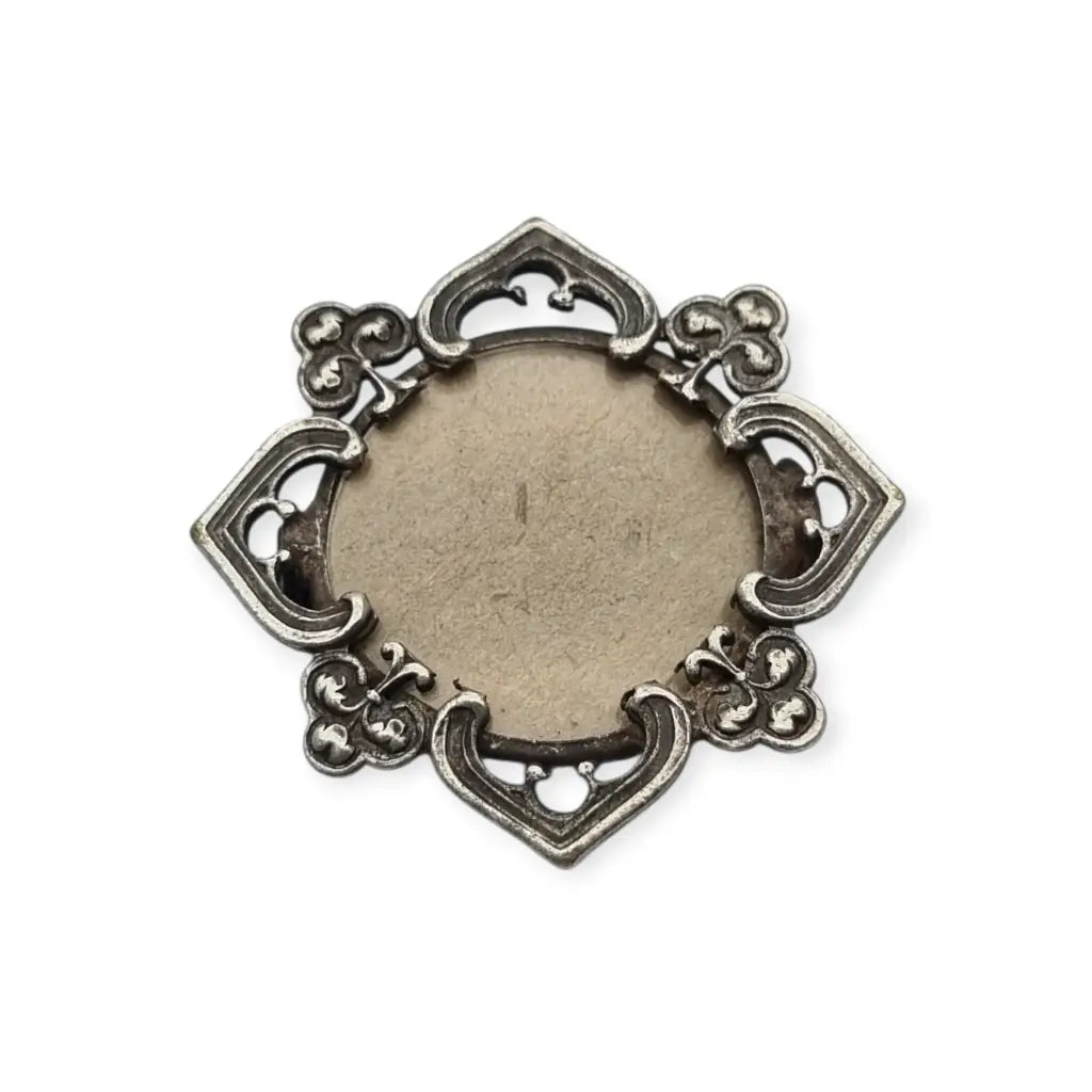 Broche guardapelo porta retrato en metal calado Art Nouveau con motivos