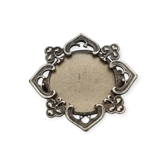 Broche guardapelo porta retrato en metal calado Art Nouveau con motivos