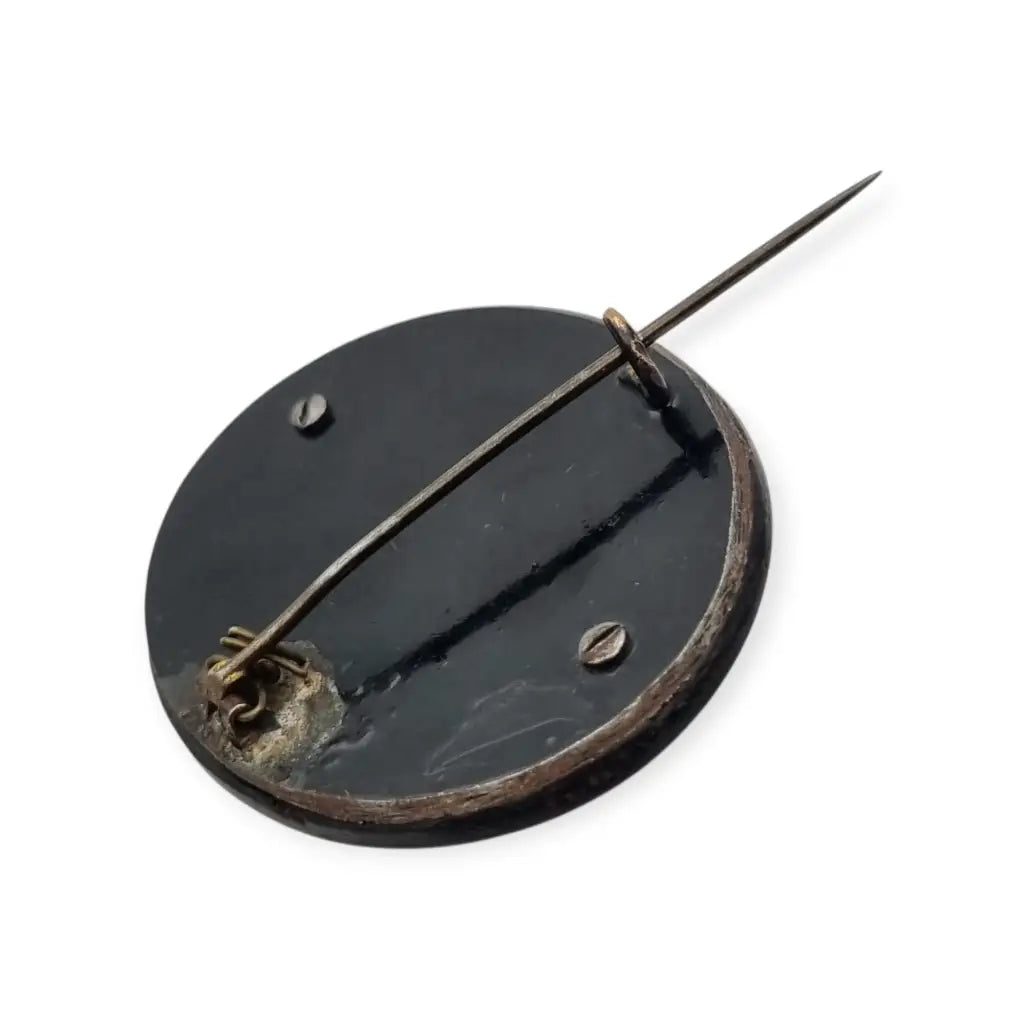 Broche de luto victoriano en camafeo floral negro flores talladas vulcanita