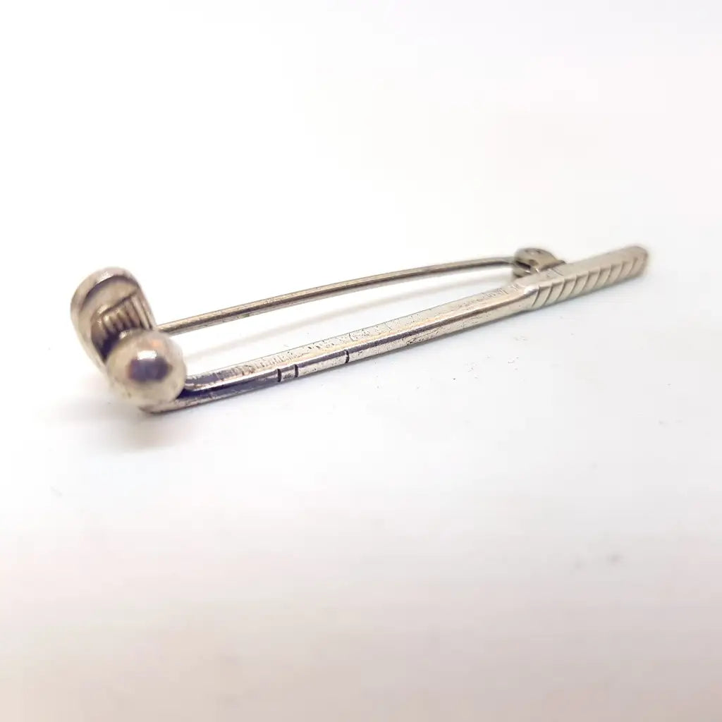 Broche Palo de golf plata Circa 1980 Joyería antigua y vintage.