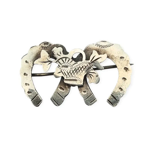 Broche victoriano antiguo de plata con herraduras y cesta floral Birmingham